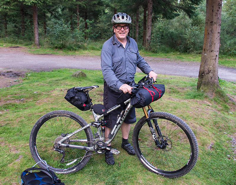 cyclist with mountain bike set up for a safari